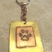 Handmade Antiqued Pawprint Keychain.