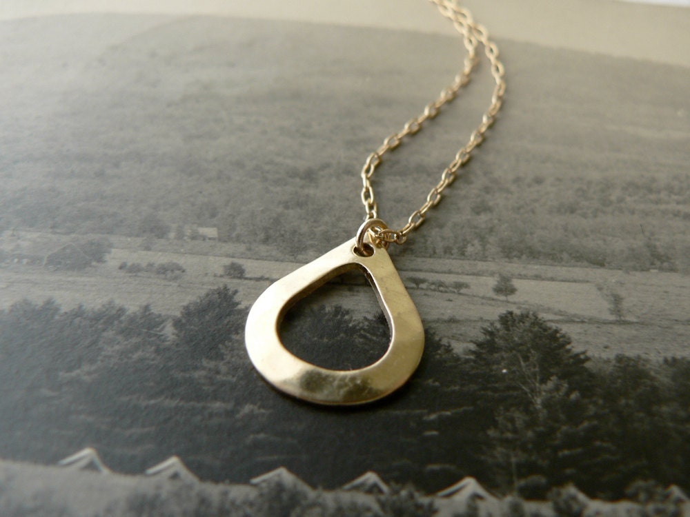 gold teardrop necklace - hammered brass pendant necklace - mountain drop necklace by windowsill