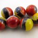 Vitro Agate Black Line Yellow Jacket Marbles