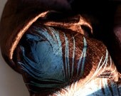 Peacock Feather fair trade silk scarf. Electric blue ink on cinnamon or black silk.