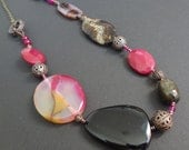 WHEN NIGHT FALLS beaded gemstone, crystal, shell, filigree and antique copper chain long ecclectic necklace. Black, hot pink, brown and red.
