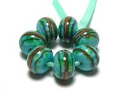Handmade Lampwork Glass Beads in Turquoise and Terracotta Swirls - set of 7