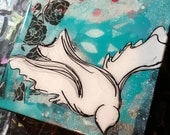 White Bird flying blue background