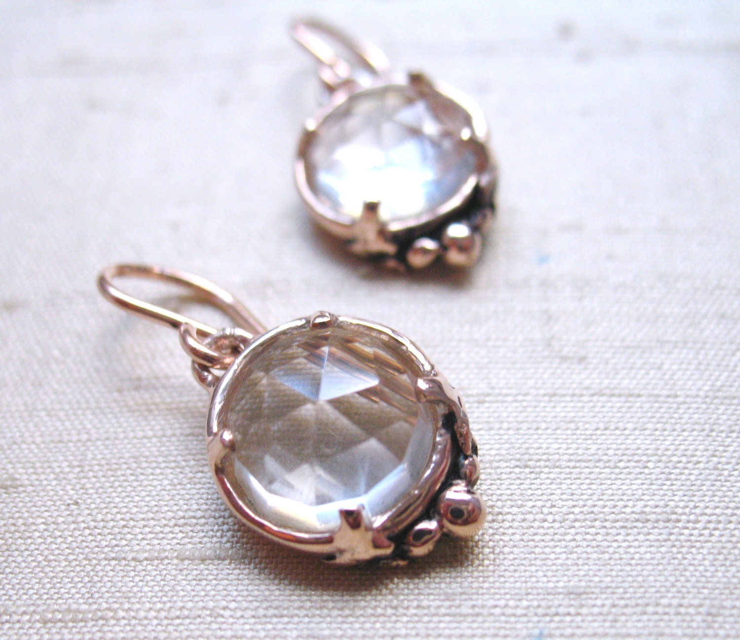Leaf Solitaire Earrings in White Topaz and Pink Silver