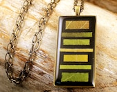spectrum of autumn in black and brass necklace