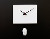 Clock created from a recycled Apple ibook laptop cover