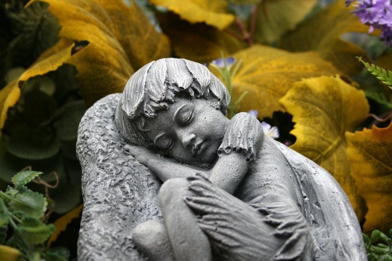 sleeping fairy garden ornament