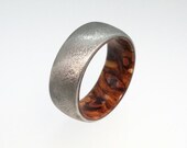 Titanium Ring with Inner Sindora Wood Sleeve and Deep Frosted Finish