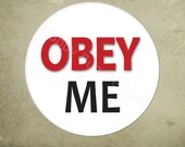 BUTTON - OBEY ME 1.25 inch  1 1/4 inch