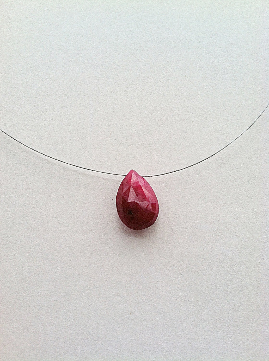 Floating necklace in ruby