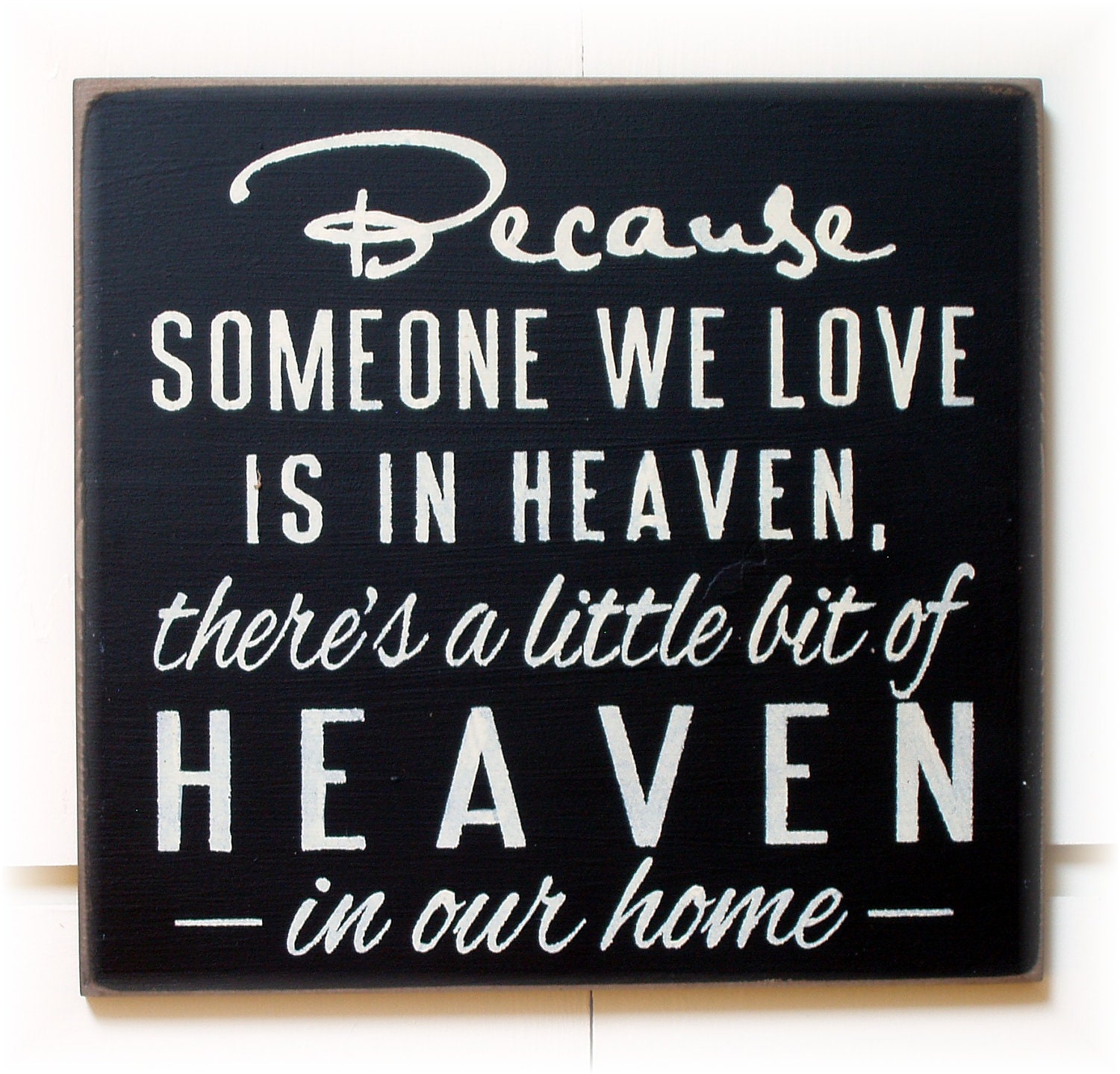 Because someone we love is in Heaven there's a little bit of Heaven in our home typography wood sign