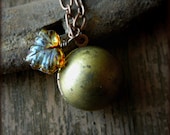 Vintage Brass Locket with Amber Colored Glass Leaf Charm.