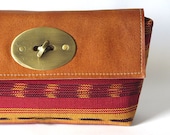 on sale. Envelope Clutch: eco leather and hand woven autumnal fabric