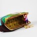 Cosmetic pouch - Girl's silhouette on purple - metal frame clutch bag