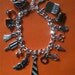 Inspired by the hottest selling trilogy - Charm Bracelet - Handcuffs Mask Tie Necktie