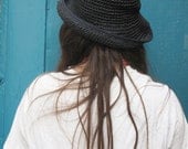 Faded navy straw hat.