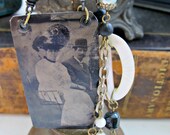 Love and Marriage.....love and marriage...go together like a.......Vintage assemblage antique tin type necklace