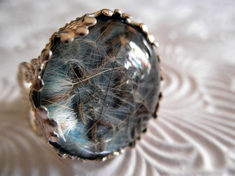 Ride The Wind-Victorian Filigree Pressed Flower Glass Ring-Dandelion Seeds Atop Ocean Blue Green Background-Symbolize Affection, Happiness