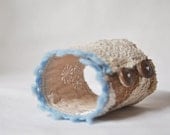 Upcycled asymmetrical beige blue cuff made of recycled sweaters. Decorated with vintage cotton lace. Upcycled accessories Eco friendly