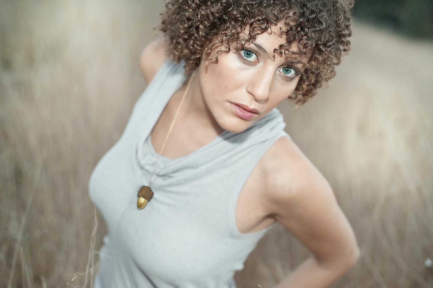 Gold acorn necklace with shell