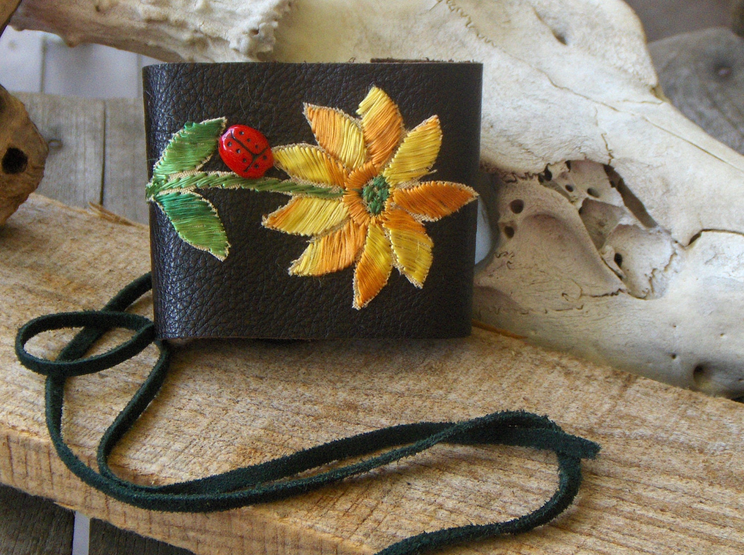 Ladybug Saver of The Crops. Victorian style leather corsette laced cuff. Sunflower embellished
