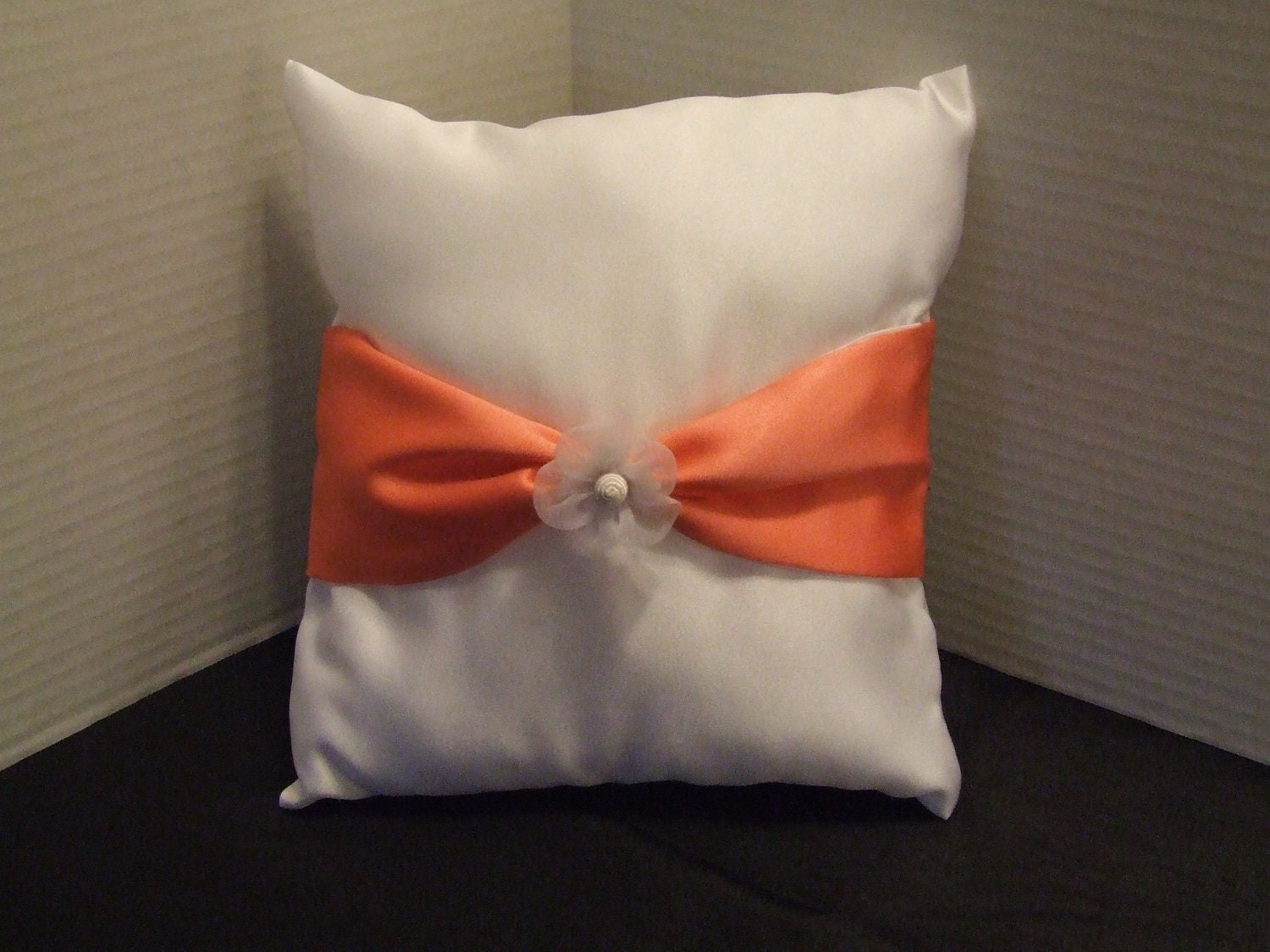 White Satin Pillow with Coral Ribbon