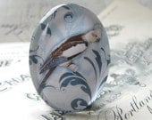 Perched bird, blue cockatiel - glass oval cab, handmade cabochon, 40x30 30x40 40x30mm 30x40mm 40 30 mm, parrot on foliage wallpaper