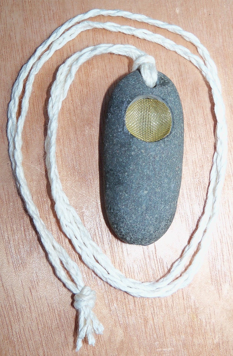 Beach Stone Pipe Pendant on White Braided Bamboo Cord