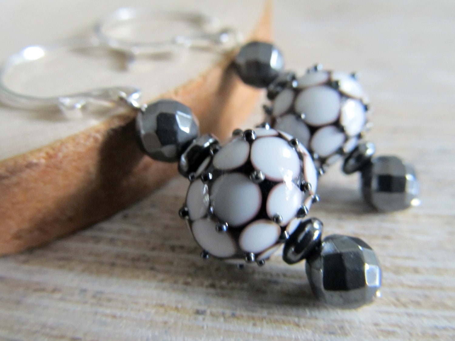 Lampwork earrings, studded hand blown lampwork beads in ivory, jet black and hematite with a lace like pattern