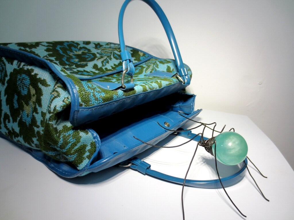 Beautiful Swirled Aqua Blue Spider Wants To Go Home With You