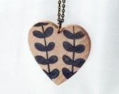 Retro mod abstract stem hand stamped pendant