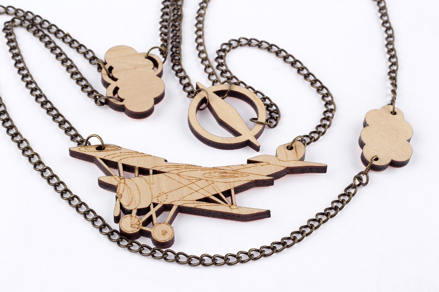 Come fly with me. Laser cut wood necklace.