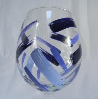 Wine glass hand painted with blue stripes