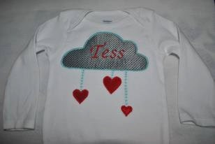 Baby's first Valentine's Day Personalized Girl Onesie with name embroidered long sleeve custom "It's Raining Love" cloud raining hearts
