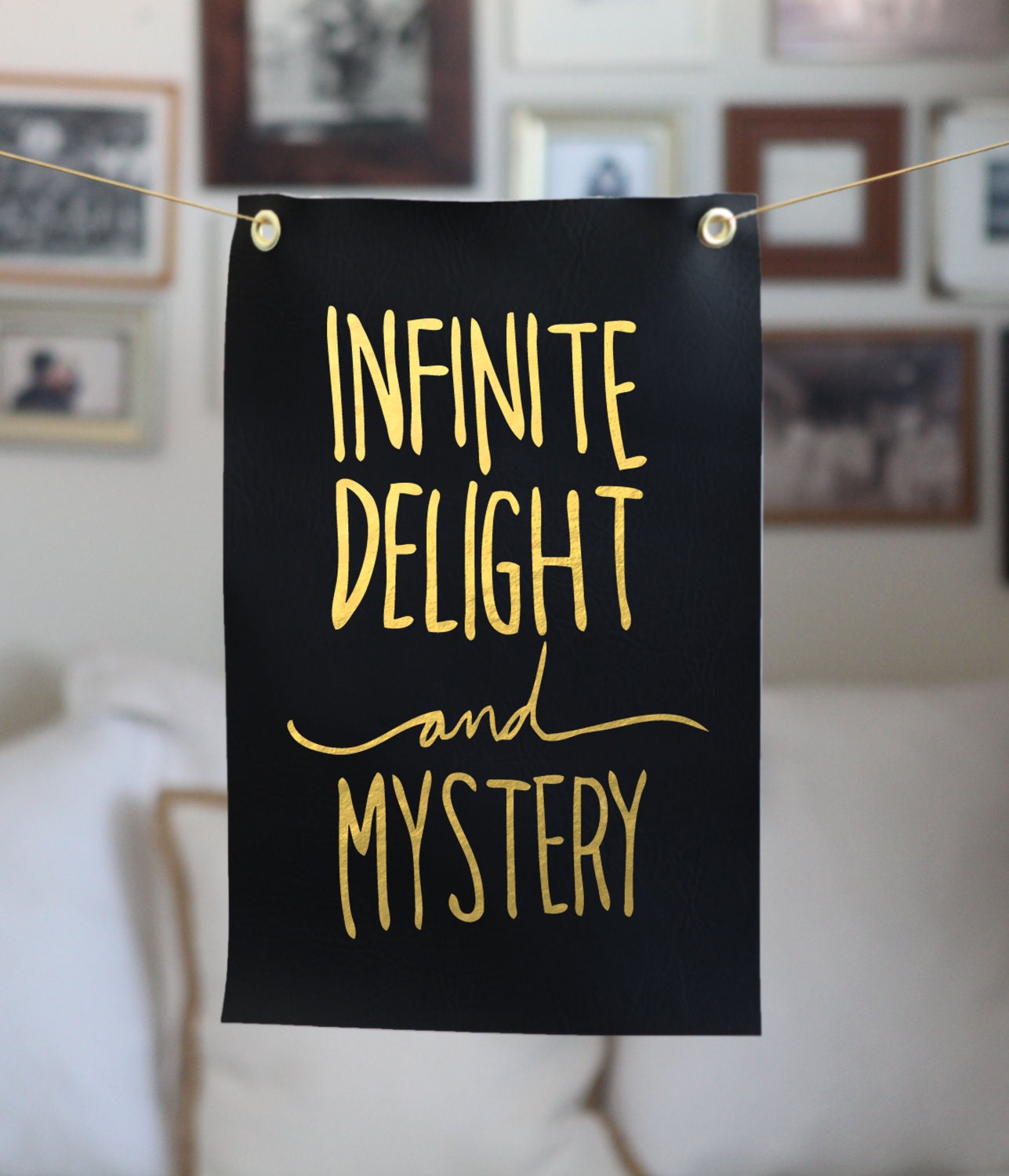 gilded poster: "infinite delight"