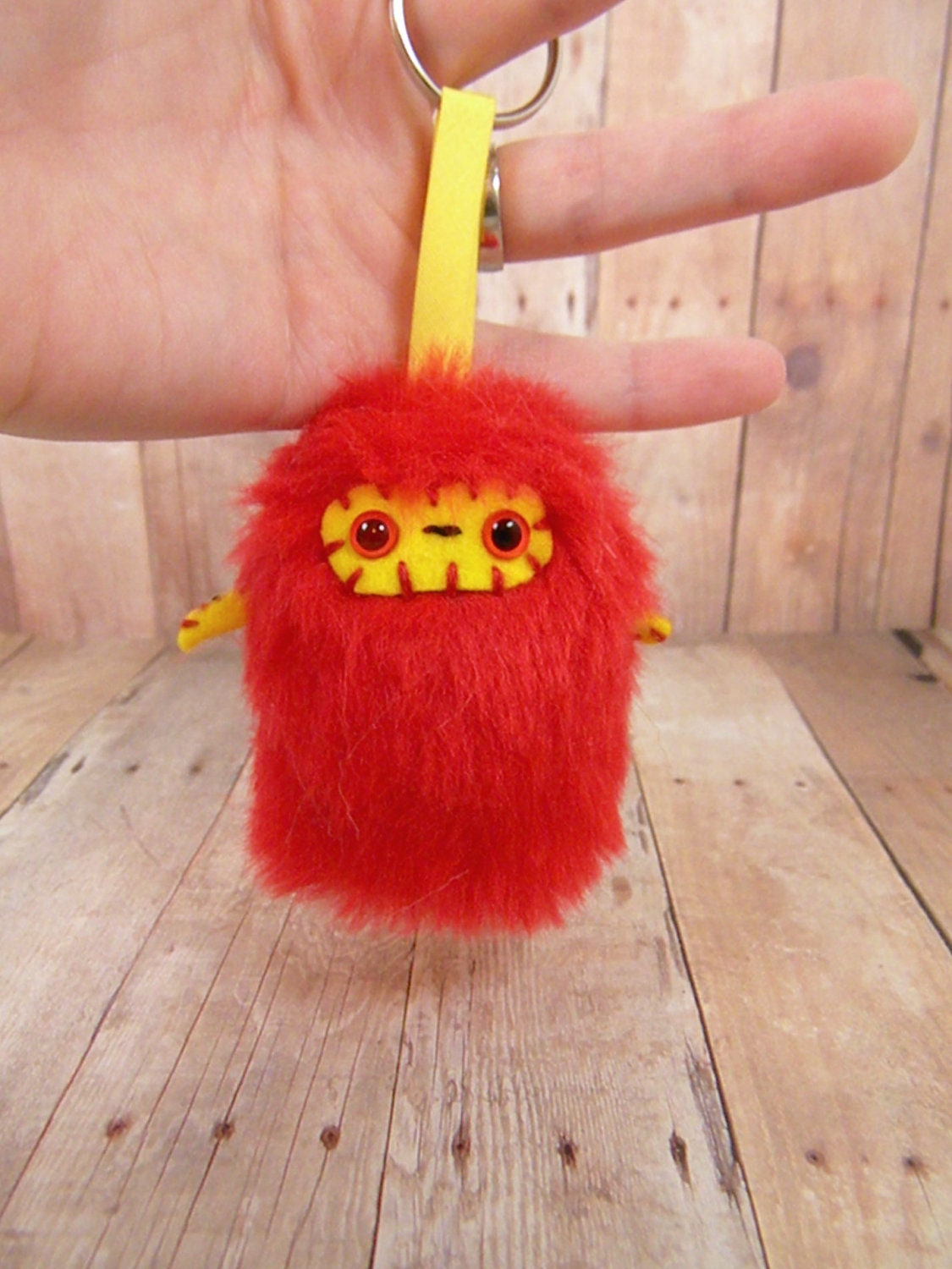 Nevvi the plush monster miniature red and yellow Little Ugglette keychain