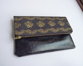 Multi purpose black leather and patterned fabric clutch bag