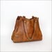 1970s honey leather hobo / flared saddle bag