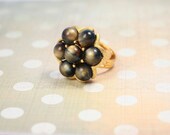 Ring repurposed vintage. Gold tone and adjustable.  Beautiful and one of a kind.