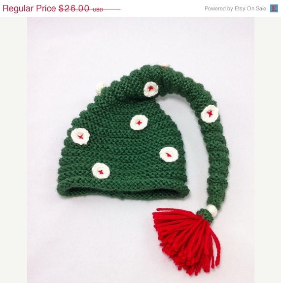 ON SALE Newborn dark green knitted baby hat, pixie hat, elf hat, with crocheted buttons and red tassel, photo prop - BitsOfFiber