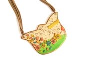 Story statement necklace polymer clay bib necklace wearable art yellow teal pink flowers on nude and green The girl who walked flowers ooak