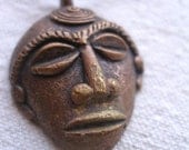 African brass mask pendant with leather cord by Fianaturals