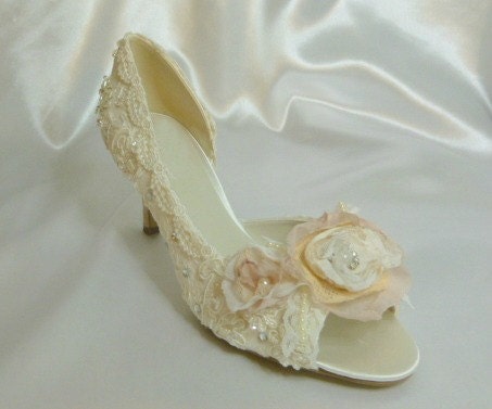 Lacey Rose ... has a shabby chic hand made rosette to adorn the toes