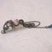Steampunk Ear Cuff With Chains And Teal Green Beads