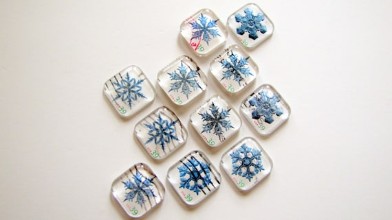 Snowflake recycled postage stamp magnets - set of 4