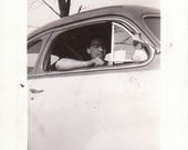 Vintage Photograph of  a man in his car
