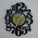 Vinyl Record Wall Clock (artist is Mary Tarvers)