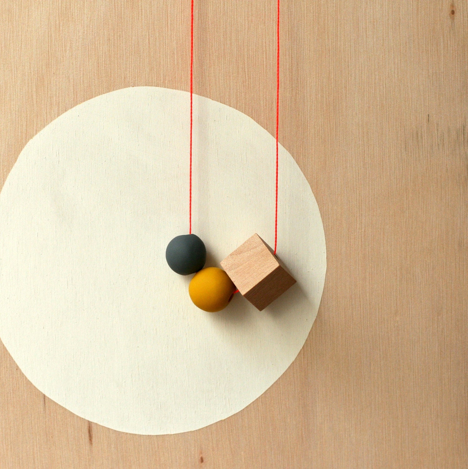 and a cube makes a necklace