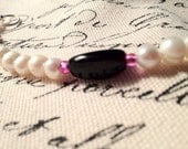 Adornment Bracelet: Black and Pink