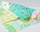 Quilting cotton fabric designer scrap roll Green tones.